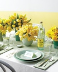 mint plates and yellow flowers